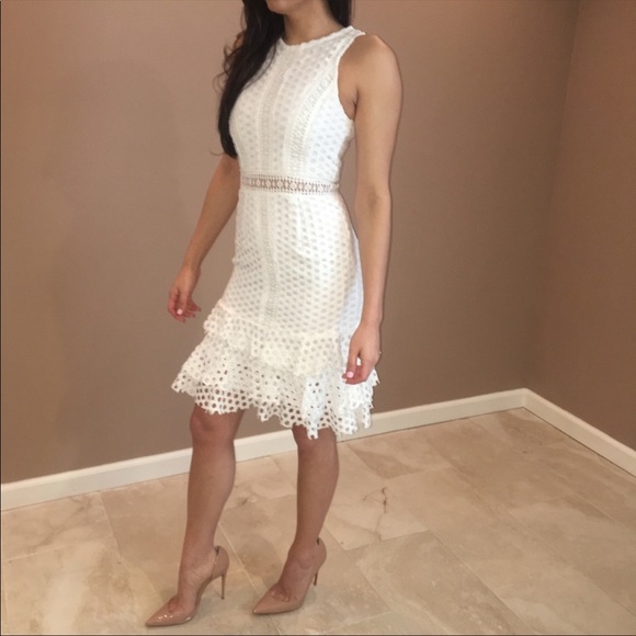 Aqua Dresses & Skirts - White ruffle laser cut design dress -Aqua